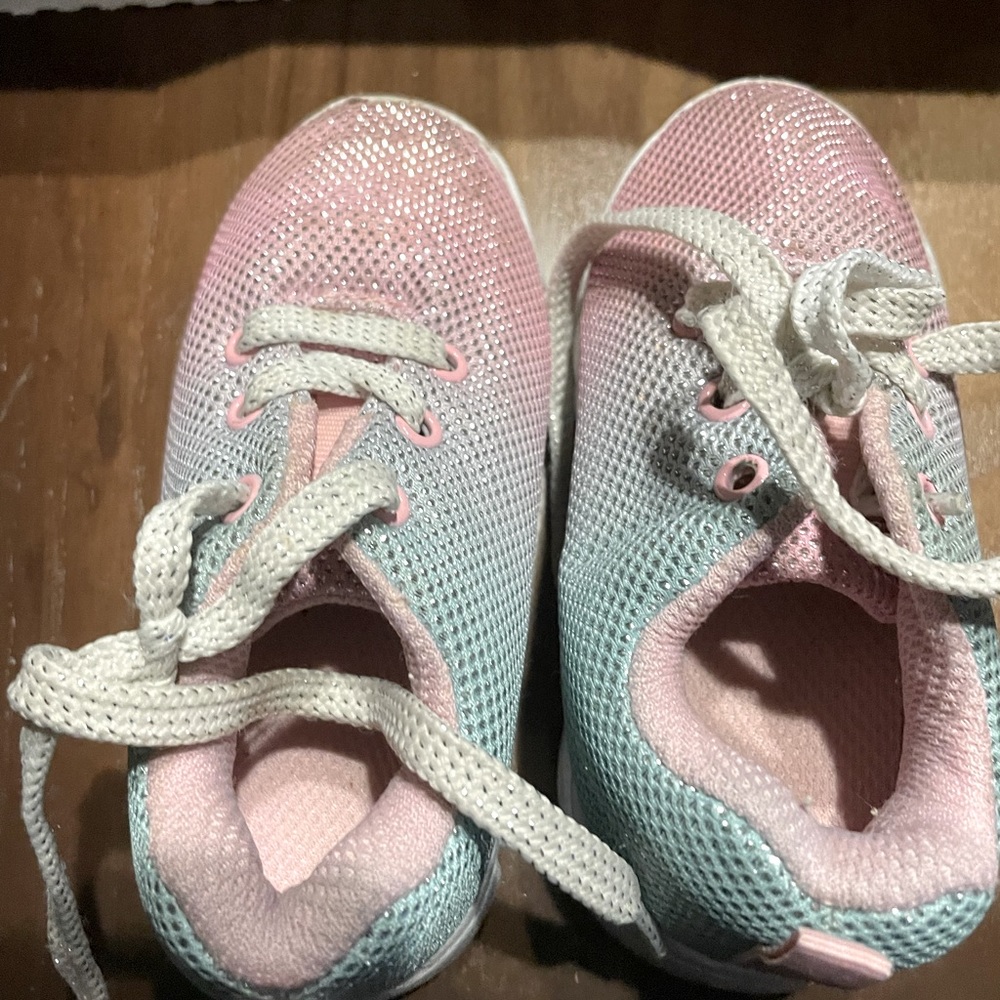 Shoe says size 6 color has blue/green and pink on them